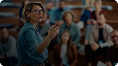 Lecturer presenting to a lecture hall of students